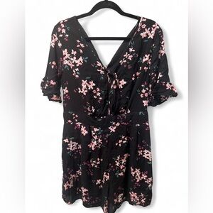Candie's Elegant Black Romper with Pink Floral Design